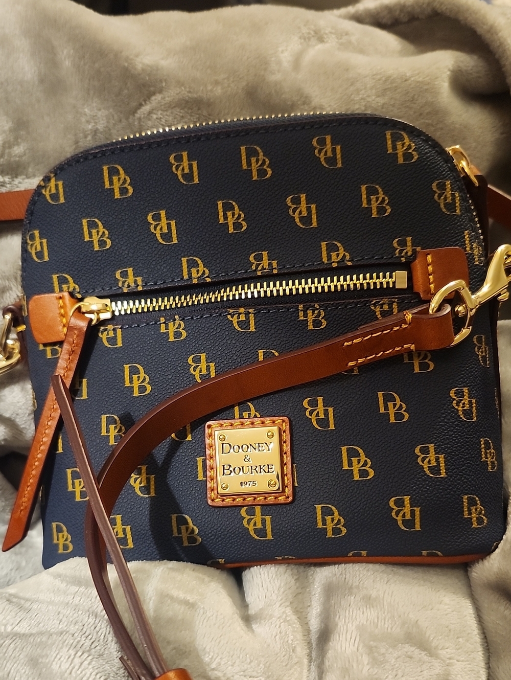 Dooney & Bourke Navy and Tan Logo Crossbody with Gold Hardware